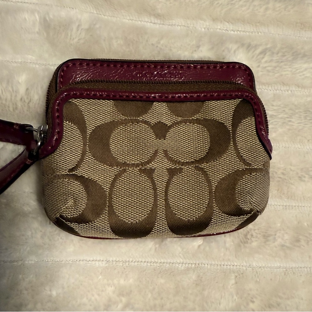 Coach Pink and signature canvas print wallet